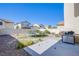 Residential backyard with a trampoline and grill for outdoor enjoyment at 4429 E Azure Ave, Las Vegas, NV 89115