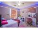 Cozy bedroom with LED strip lights, window, and furnishings at 4429 E Azure Ave, Las Vegas, NV 89115