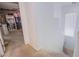 Bright hallway with carpet stairs leading to the upper level of the home at 4429 E Azure Ave, Las Vegas, NV 89115