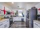 Bright kitchen featuring stainless steel appliances, white cabinets with modern hardware at 4429 E Azure Ave, Las Vegas, NV 89115