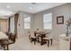 Dining area adjacent to kitchen with seating for four at 4537 Cloudrest Peak St, North Las Vegas, NV 89031