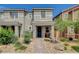 Charming two-story home with well-maintained landscaping and a welcoming front porch at 4537 Cloudrest Peak St, North Las Vegas, NV 89031