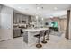Modern kitchen featuring a spacious island, stainless steel appliances, and an open layout at 4537 Cloudrest Peak St, North Las Vegas, NV 89031