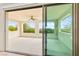 Covered balcony featuring ample space, a ceiling fan, and beautiful views of the surrounding landscape at 454 Rosina Vista St, Las Vegas, NV 89138
