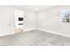 This carpeted bedroom has a window and an ensuite fireplace at 454 Rosina Vista St, Las Vegas, NV 89138
