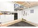 Organized garage with ample storage cabinets, overhead racks, and well-maintained epoxy flooring at 454 Rosina Vista St, Las Vegas, NV 89138