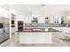 Bright modern kitchen featuring white cabinets and a spacious center island at 454 Rosina Vista St, Las Vegas, NV 89138