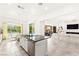 Spacious eat-in kitchen with a center island and open flow to the living room at 454 Rosina Vista St, Las Vegas, NV 89138