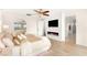Bright main bedroom features a fireplace, TV, and views through an arched mirror at 454 Rosina Vista St, Las Vegas, NV 89138