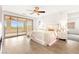 Spacious main bedroom featuring a plush bed, private balcony access, and elegant furnishings at 454 Rosina Vista St, Las Vegas, NV 89138