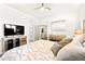 A bedroom features a patterned bedspread and mirrored furniture at 454 Rosina Vista St, Las Vegas, NV 89138