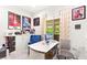 Spacious office featuring a desk, built-in shelving, and a view of the backyard pool at 454 Rosina Vista St, Las Vegas, NV 89138