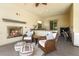 Covered patio seating area features a fireplace, bar and counter seating at 454 Rosina Vista St, Las Vegas, NV 89138