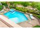 A beautiful private pool and spa offer a refreshing retreat surrounded by lush landscaping at 454 Rosina Vista St, Las Vegas, NV 89138