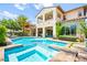 Luxury home featuring sparkling pool, jacuzzi, and backyard at 454 Rosina Vista St, Las Vegas, NV 89138