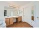 Bathroom with double sink vanity, and framed mirror at 4744 Deer Forest Ave, Las Vegas, NV 89139