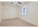 Bedroom with neutral carpet, light walls, and double wardrobe at 4744 Deer Forest Ave, Las Vegas, NV 89139
