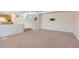 Bright living room with stairs leading to upper level and open to the kitchen at 4744 Deer Forest Ave, Las Vegas, NV 89139
