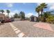 Large backyard with storage sheds, providing ample space for hobbies or parking extra vehicles at 4883 Grey Mesa St, Las Vegas, NV 89149
