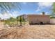 Spacious backyard with potential for landscaping and outdoor activities on a sunny day at 4883 Grey Mesa St, Las Vegas, NV 89149