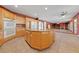Kitchen with island, appliances, and views of the dining area and living room at 4883 Grey Mesa St, Las Vegas, NV 89149