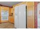 Close up of a kitchen showing stainless steel fridge, cabinets, and double oven at 4883 Grey Mesa St, Las Vegas, NV 89149