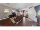Inviting living room with hardwood floors, comfortable seating, and a warm, welcoming atmosphere at 4883 Grey Mesa St, Las Vegas, NV 89149