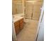 Bright bathroom featuring a tiled shower-tub combo and a vanity with a sink at 5155 W Tropicana Ave # 2140, Las Vegas, NV 89103