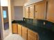 Kitchen with granite counters and bright natural light at 5155 W Tropicana Ave # 2140, Las Vegas, NV 89103