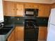 Kitchen with matching appliances and granite counters at 5155 W Tropicana Ave # 2140, Las Vegas, NV 89103