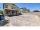 This large backyard has pavers, a patio cover, brick walls, and plenty of space at 5966 Icicle Falls Ave, Las Vegas, NV 89130