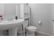 Cozy powder bathroom with vanity and overhead storage space at 5966 Icicle Falls Ave, Las Vegas, NV 89130