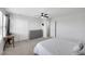 Clean bedroom featuring a sliding-door closet, a desk and a comfortable bed at 5966 Icicle Falls Ave, Las Vegas, NV 89130