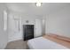 Tastefully decorated bedroom featuring a full dresser with sleek black finish at 5966 Icicle Falls Ave, Las Vegas, NV 89130