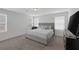 Comfortable bedroom featuring wall to wall carpeting, and neutral wall paint at 5966 Icicle Falls Ave, Las Vegas, NV 89130