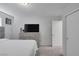Comfortable bedroom featuring a bed, dresser, and neutral decor at 5966 Icicle Falls Ave, Las Vegas, NV 89130
