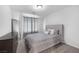 Comfortable bedroom with plush carpeting, stylish décor, and soft, natural light at 5966 Icicle Falls Ave, Las Vegas, NV 89130
