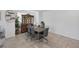 Dining area featuring stylish chairs and a wooden china cabinet at 5966 Icicle Falls Ave, Las Vegas, NV 89130