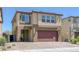 Charming two-story home with a two-car garage and inviting front entry at 5966 Icicle Falls Ave, Las Vegas, NV 89130