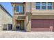 Charming two-story home with a two-car garage and inviting front entry at 5966 Icicle Falls Ave, Las Vegas, NV 89130