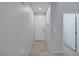 Bright foyer featuring tile flooring and a view of the front door at 5966 Icicle Falls Ave, Las Vegas, NV 89130