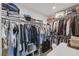 Walk-in closet with ample hanging space, shelving, and organized storage solutions at 5966 Icicle Falls Ave, Las Vegas, NV 89130