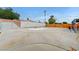 Large backyard featuring a fenced pool and a spacious concrete patio at 601 Huntington St, Las Vegas, NV 89107