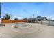Expansive backyard with an empty pool, patio area, and secure fencing at 601 Huntington St, Las Vegas, NV 89107
