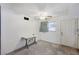 The cozy kitchen featuring a ceiling fan, a side window, white door and walls at 601 Huntington St, Las Vegas, NV 89107