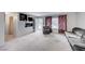Bright living room with a comfortable seating area, a built-in fish tank, and access to the outdoors at 601 Huntington St, Las Vegas, NV 89107