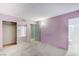 Spacious main bedroom with carpet flooring, ensuite bath, and mirrored closet door at 601 Huntington St, Las Vegas, NV 89107