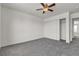 Bright bedroom with a ceiling fan and a closet at 6117 Daisy Lee Ave, Las Vegas, NV 89108