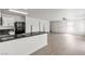 The kitchen features granite countertops, stainless appliances, ample counter space, and access to the living room at 6117 Daisy Lee Ave, Las Vegas, NV 89108