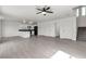 Expansive living area features lots of natural light, modern flooring, and direct access to the staircase at 6117 Daisy Lee Ave, Las Vegas, NV 89108